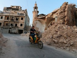 Путин поручил начать масштабную гуманитарную операцию в Алеппо