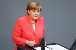 Меркель хочет удержать Грецию в еврозоне