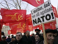 НАТО: юбилейные тосты и головная боль НАТО: юбилейные тосты и головная боль