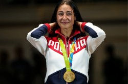 Сборная России выиграла пять медалей в третий день Олимпиады Сборная России выиграла пять медалей в третий день Олимпиады