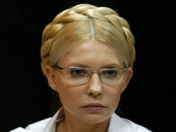 Тимошенко обвинила Порошенко в тайной сделке с МВФ Тимошенко обвинила Порошенко в тайной сделке с МВФ