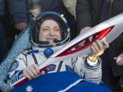 Олимпийский факел приземлился Олимпийский факел приземлился