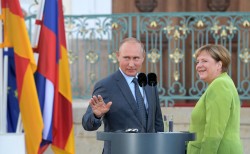 Путин и Меркель провели переговоры Путин и Меркель провели переговоры
