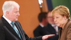 Глава МВД Германии заявил о нежелании работать с Меркель