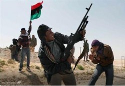 Оппозиция захватила родной город Каддафи
