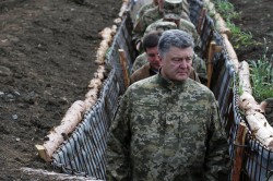 Порошенко выгодно начать большую войну в Донбассе Порошенко выгодно начать большую войну в Донбассе