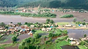 Из-за паводка три района Иркутской области ушли под воду Из-за паводка три района Иркутской области ушли под воду